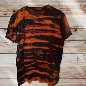 STRANGER THING SIZE LARGE GOLDEN AND BLACK T SHIRT